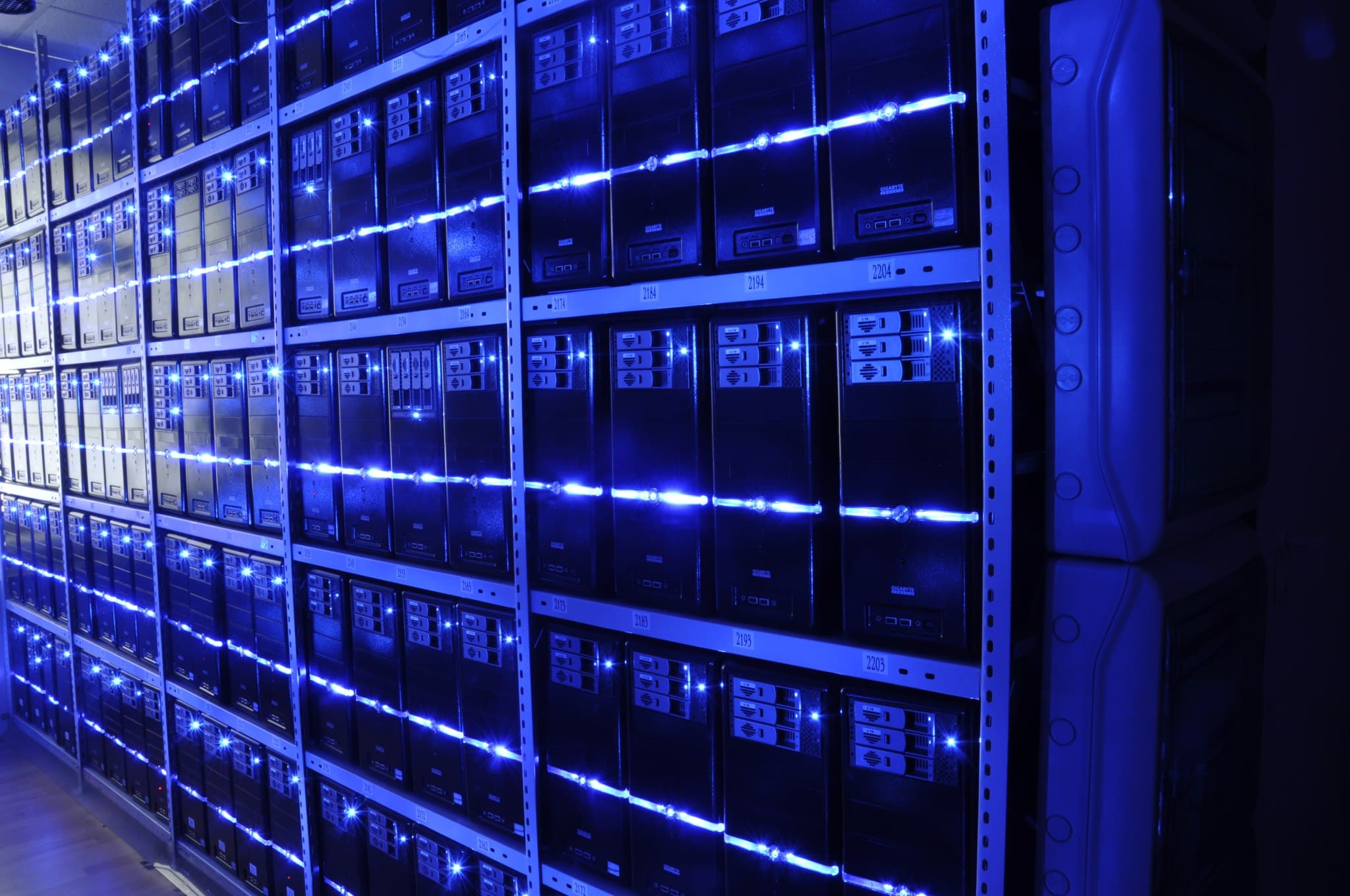 A data-centre server room. Illustrative of the compute infrastructure behind Anthropic's falling cost-per-dollar-of-revenue ratio, not a photograph of an Anthropic facility.