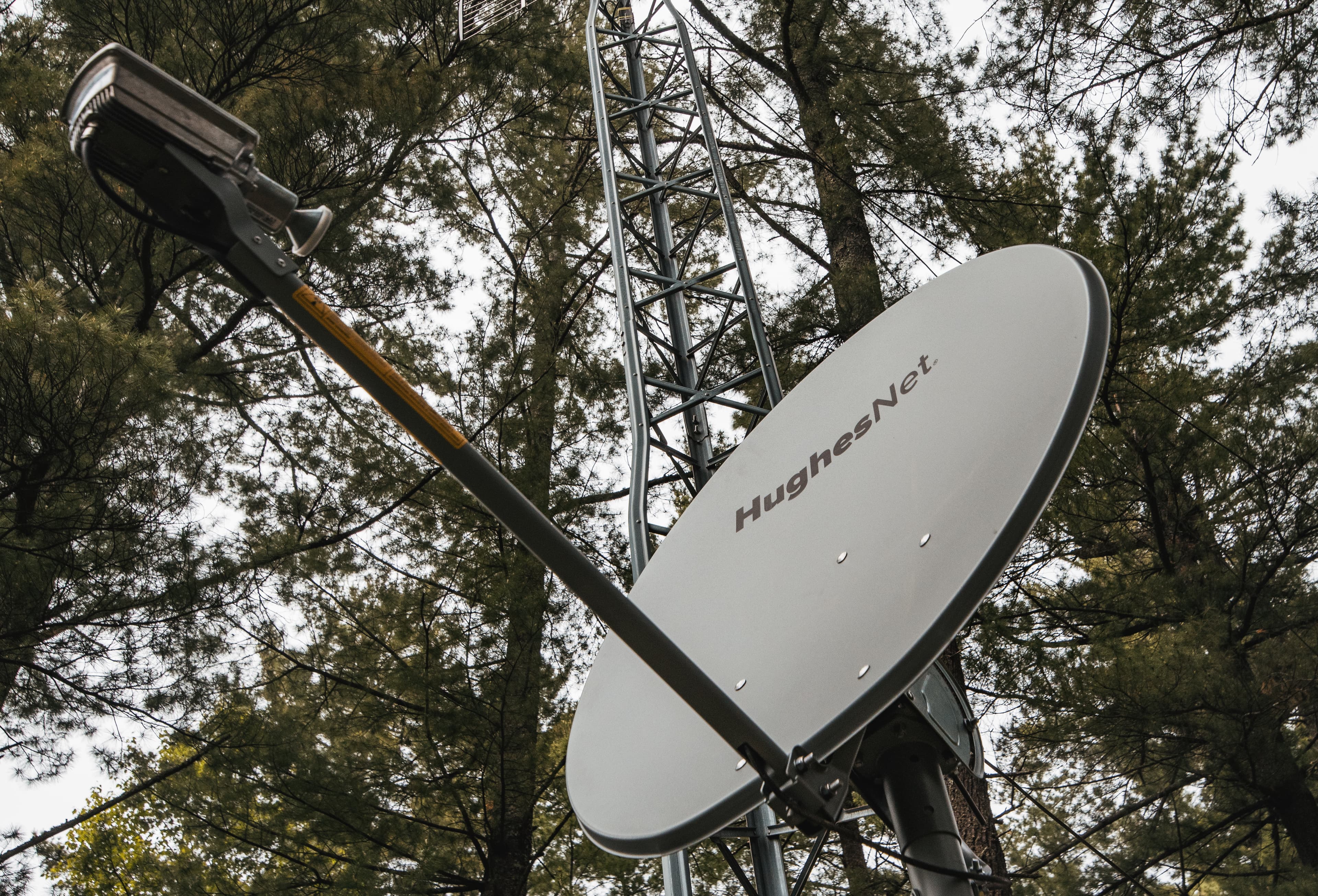A satellite internet dish mounted at a rural property. Illustrative image — not a photograph of Starlink's Kenyan network.