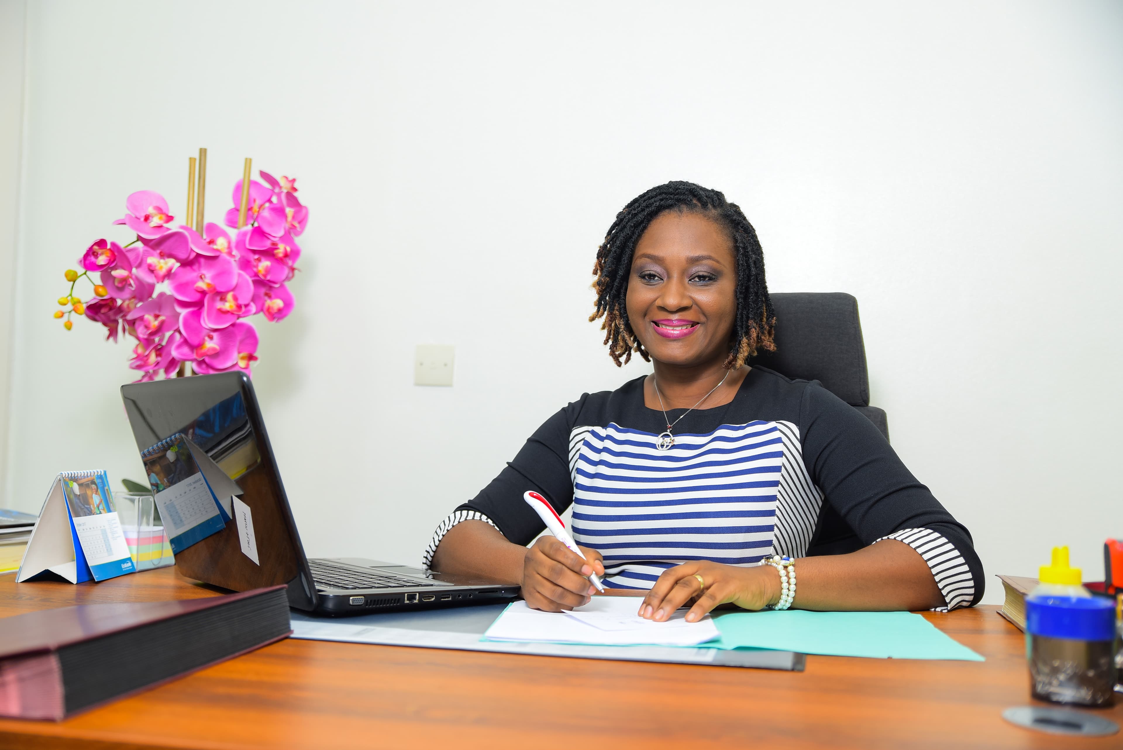 Illustrative: a businesswoman at work in Abidjan, Cote d'Ivoire. Not a subject named in this story, but representative of the founders behind the funding data.