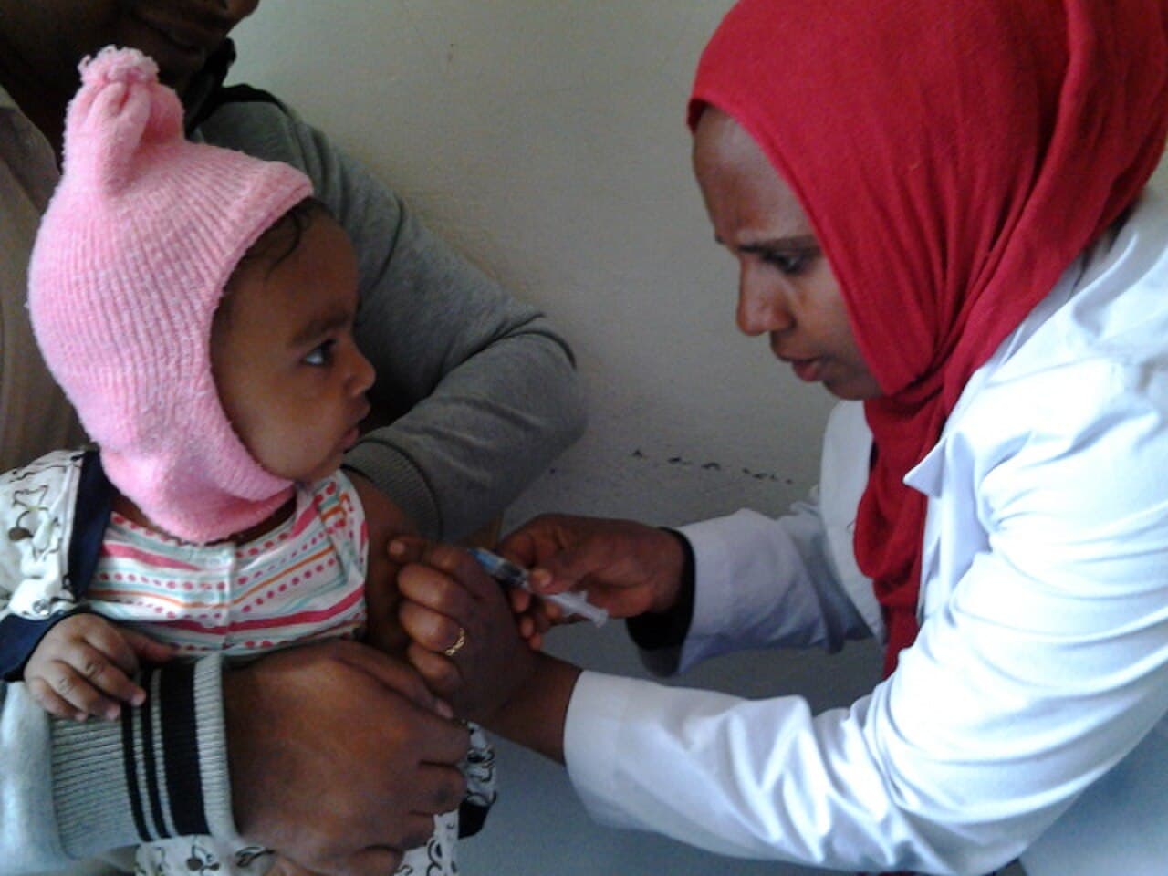A health worker administers a vaccine to an infant in Ethiopia. Africa aims to manufacture 60% of the vaccines it uses by 2040, up from under 1% during the COVID-19 pandemic. (Illustrative)